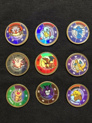 Vintage 1999 Pokemon Battling Coins Game (9) Coins Charizard Dragonite Squirtle
