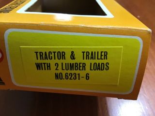 Cox HO scale Tractor and trailer W/ 2 lumber loads ‘No 6231 - 6” 3