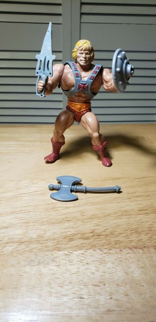 He - Man And Road Ripper Vintage Action Figure.  Mattel.  Weapons/accessories Motu