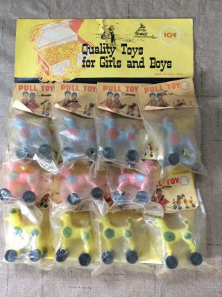 Vintage 1950’s Plastic Pull Toy Display And Toys