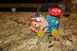 Vintage Fisher Price No.  695 - Pig In Overalls Spring Tail Wooden Clicking Toy