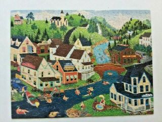 Great American Puzzle Factory " Tubing " 550 Piece Jigsaw Puzzle By Bob Logrippo