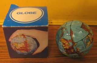 The World At Your Fingertips W/ Vtg Magic Globe Puzzle Rubik 