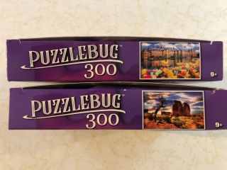 Set Of 2 - 300 Piece Jigsaw Puzzles - Puzzlebug - Artbox - Cra - Z - Art 2