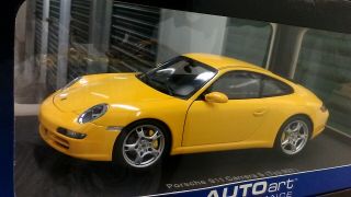 1:18 Scale Model By Autoart Porsche 911 Carrera S (typ 997) Coupe In Yellow.