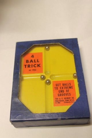 Vintage 1920’s A.  C.  Gilbert 4 Ball Trick Puzzle Game