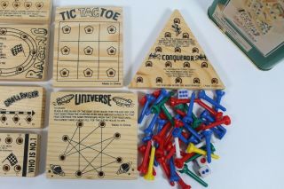 7 Piece Wood Brain Teaser Games Tin Can Tic Tac Toe Magic Universe Peg Game 3