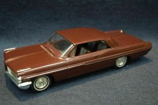 1962 Pontiac Bonneville Dealer Promo Friction Car Model (burgundy Metallic)
