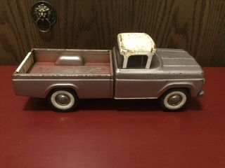 Vintage Nylint Pressed Metal Ford Pickup Truck With Opening Tailgate 1960’s 14”.