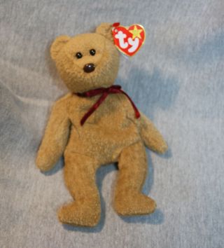Ty Beanie Babies " Curly " The Bear Retired Style Number 4052