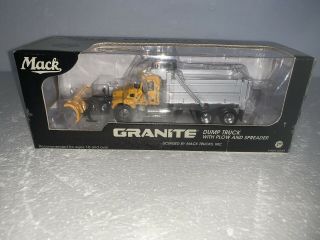 First Gear,  1:64 Scale,  Mack Granite Dump Truck With Plow And Spreader,  69 - 0021
