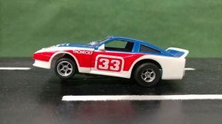 Afx Aurora Tomy 33 Afx Racing Nissan 1:64 Scale Slot Car W/ Mag Chassis