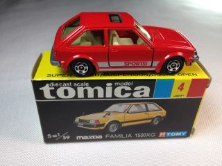 Tomy,  Tomica 4 Mazda Familia 1500xg - - (red) Vintage Collector 