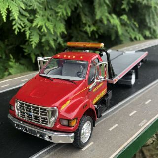 First Gear 1/34 Ford F650 Miller Roll Back Tow Truck