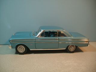 Collectible 1:18 Scale Falcon Blue 1964 Ford Falcon Diecast By Road Signature