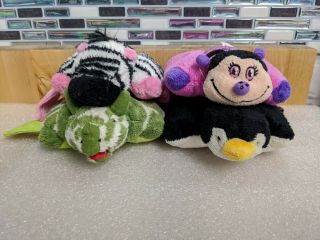 4 Pillow Pet Dream Lites Ladybug,  Penguin,  Zebra,  Triceratops -