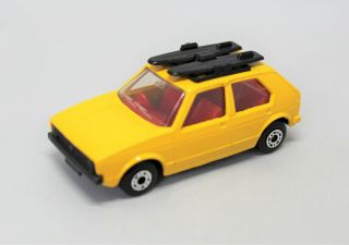 Matchbox Superfast No7 Volkswagen Golf In Yellow With " Gloss Black Base "