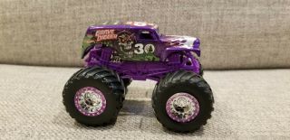 Hot Wheels Monster Jam 1:64 Scale Grave Digger 30th Anniversary Spectraflame