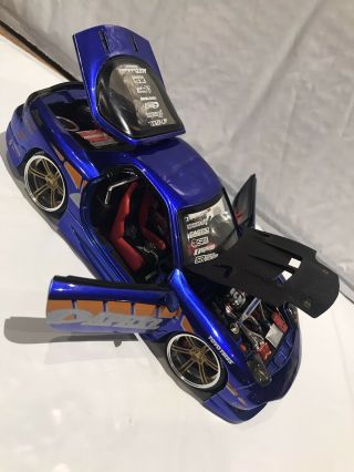 Jada Toys Die Cast 1:24 Scale Import Racers Mazda Rx - 7 Apex Logo Blue