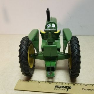 Toy Ertl John Deere 3010 row crop tractor with die cast rear rims.  1 3
