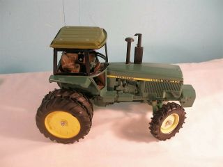 Ertl John Deere Model Tractor 4850,  1/16th Scale,  Orleans Collector 1982