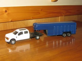 Ertl 1/64 Custom Built Ford F350 Flatbed With Custom Painted Cattle Trailer.