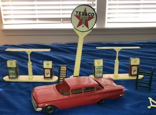 Vintage 1960’s Texaco Toy Gas Station Model With Pumps,  Signs And Chevy (?) Car