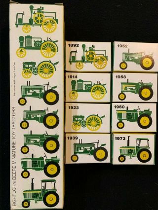 Ertl 593 Box Of Eight (8) John Deere Miniature Farm Tractors 1:64 Complete Set