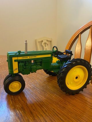 Green 1:16 John Deere 420 Toy Tractor,  Out Of Box,  Dimensions 7x5x2.  5