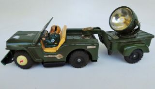 Price Drop - Now U.  S.  Army Jeep With Driver & Search Light Tin Litho Bat Operated
