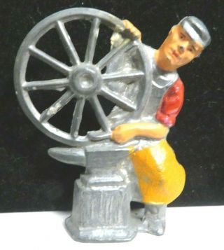 Vintage Manoil Lead Toy Figure Blacksmith With Wheel M - 150