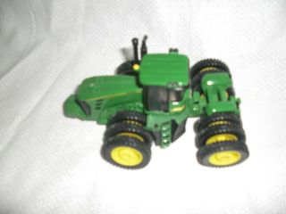 John Deere 1/64th Scale Toy Tractor With Triple Tires 9430 By Ertl Co.