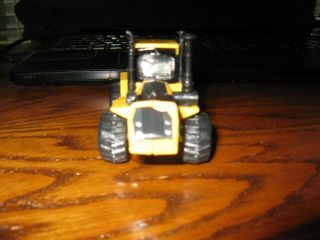 Yellow Steiger Articulated Tractor tractor toy 1/64 made by ERTL 3