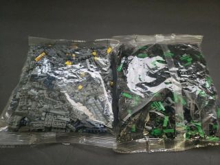2 Bag Of Legos.  Dont Know How Many In Each Or What They Are For
