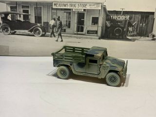 Johnny Lightning Military M998 Troop Carrier,  Camo,  Weathered 1:64 Loose