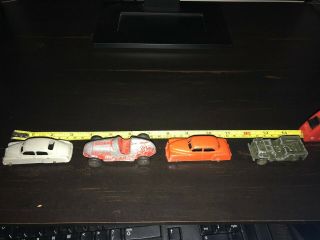 4 Vintage Die Cast Cars.  Including Goodee Jeep,  Race Car And Two Others