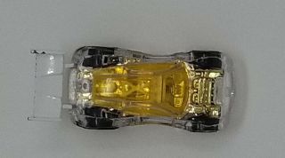 Hot Wheels X - Raycers Paradigm Shift Diecast Toy Car Translucent Yellow Body Mode