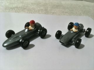 2 Vintage MAGNETO RACING CARS Plastic Made in West Germany 2.  75 
