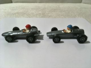 2 Vintage MAGNETO RACING CARS Plastic Made in West Germany 2.  75 