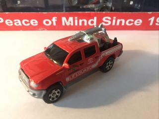 2015 Matchbox Custom Toyota Tacoma San Diego Fire Lifeguard Red