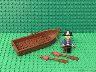Lego Pirate Captain Mini Figure And Reddish Brown Rowing Boat With 2 Oars