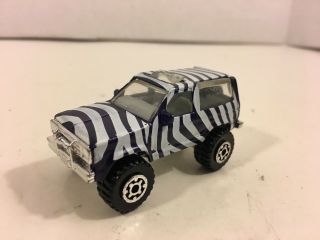Matchbox Ford Bronco 1987 Purple Zebra Stripes 1/57 Scale