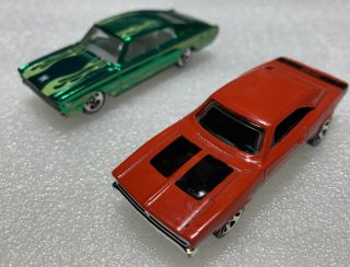 LOOSE Hot Wheels Dodge Chargers.  1 Red ‘69 R/T,  1 Metallic Green ‘67. 2