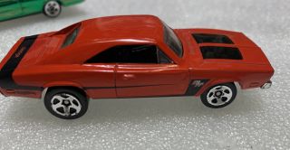 LOOSE Hot Wheels Dodge Chargers.  1 Red ‘69 R/T,  1 Metallic Green ‘67. 3