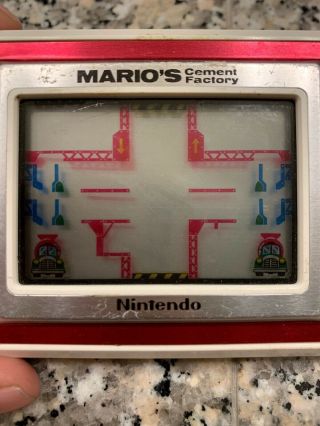 Mario ' s Game & Watch Cement Factory Handheld Video Game Great 2