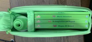 2 Leap Frog,  Tag Juniors,  8 Books,  2 Carrying Cases,  And Cord.