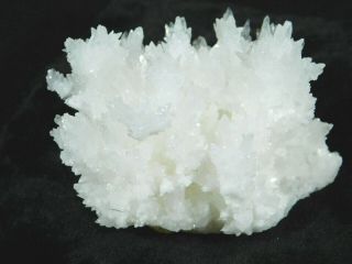 A 100 Natural Bright White Aragonite Crystal Cluster With A Stand 120gr