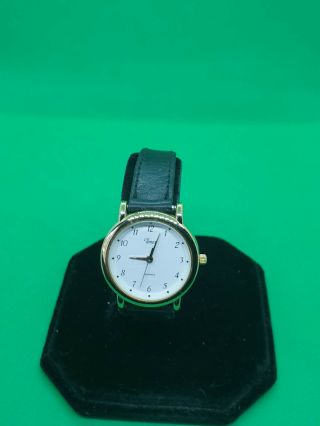 Ladies Timex Gold Tone Watch,  White Face & Gold Hands,  Black Leather Strap.  B1.
