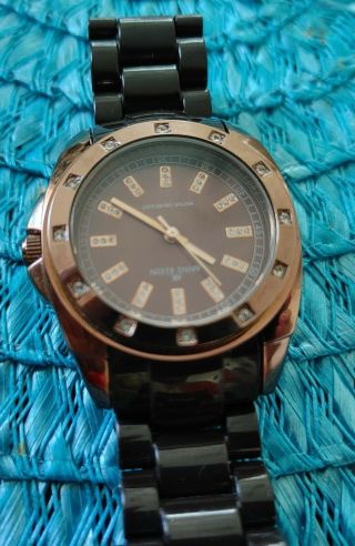 Anne Klein Ladies Watch.  Brown With Cooper Tone Face.