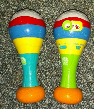 Leap Frog Learn & Groove Maracas English Spanish Count Sing Dance